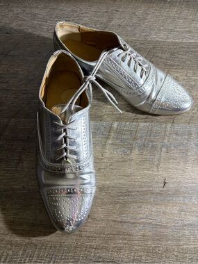 Like New J CreW Metallic Oxfords sticker tore up heal of sole not from wear